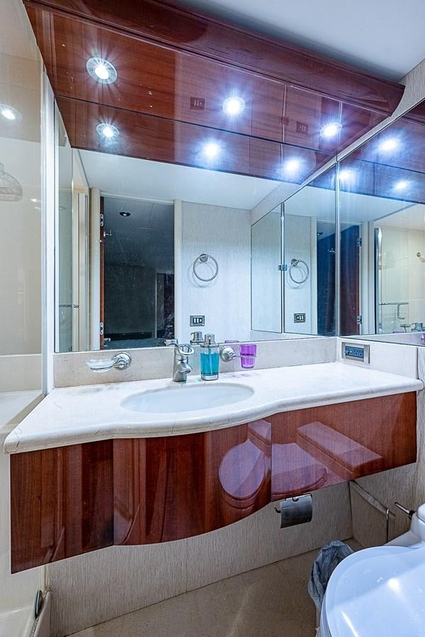 a bathroom with a large mirror aboard FINALLY Yacht for Sale