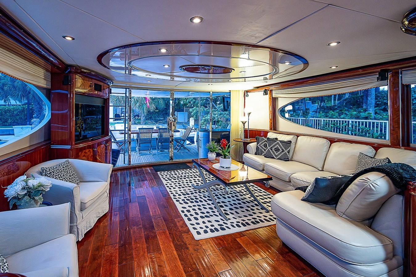 a living room with a large window aboard FINALLY Yacht for Sale