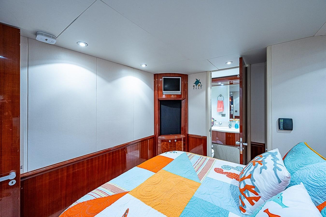 a bedroom with a bed aboard FINALLY Yacht for Sale