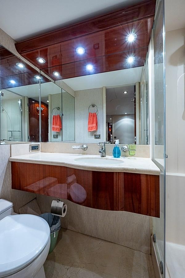 a bathroom with a large mirror aboard FINALLY Yacht for Sale