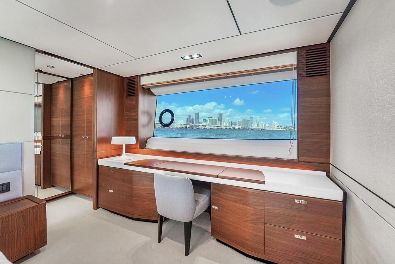 a room with a large screen aboard 78' PRINCESS Y78 2021 Yacht for Sale