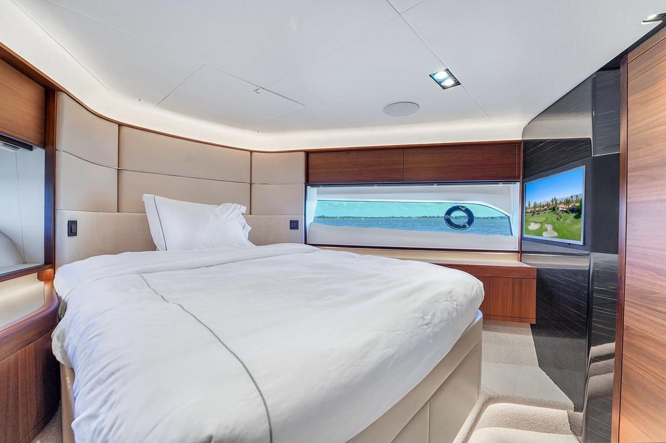 a bed in a room aboard 78' PRINCESS Y78 2021 Yacht for Sale
