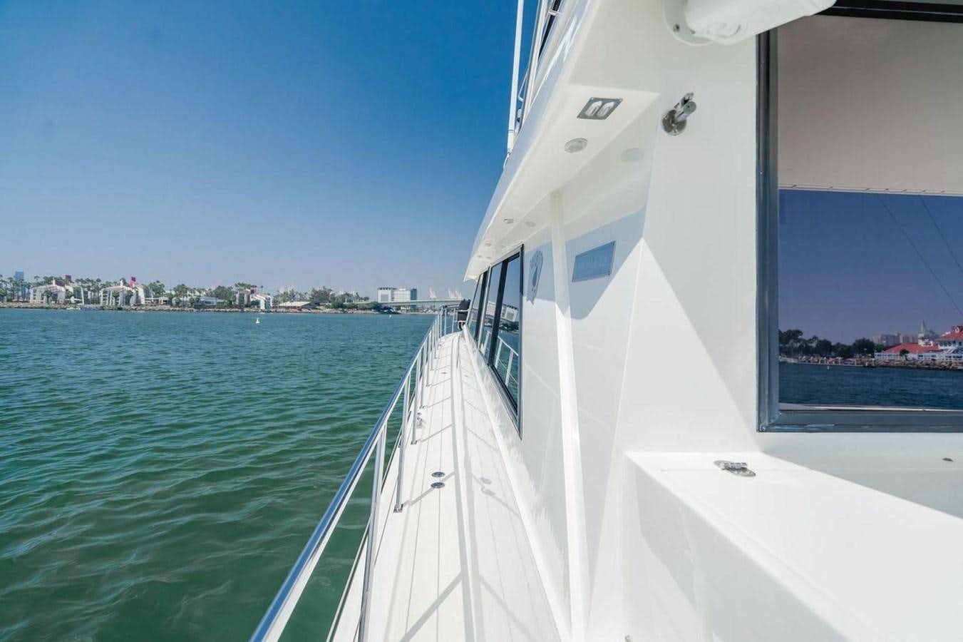 a boat on the water aboard FOUR ACES Yacht for Sale