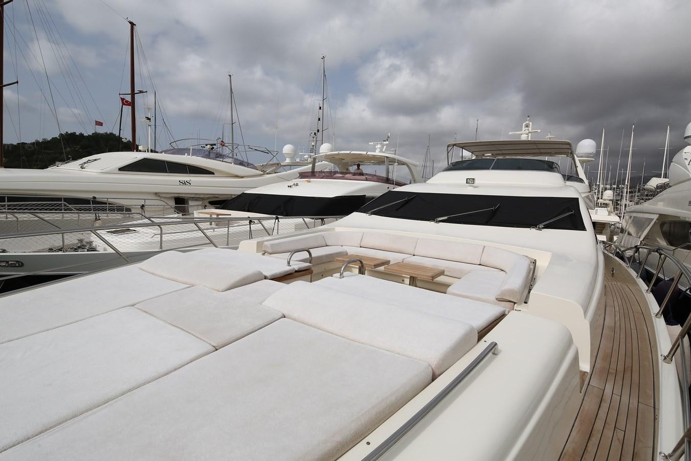 a group of boats in a harbor aboard 100 LEONARDO Yacht for Sale