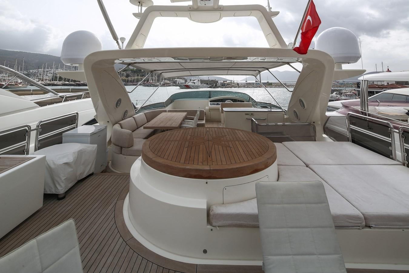a plane with a red and white flag on the front aboard 100 LEONARDO Yacht for Sale
