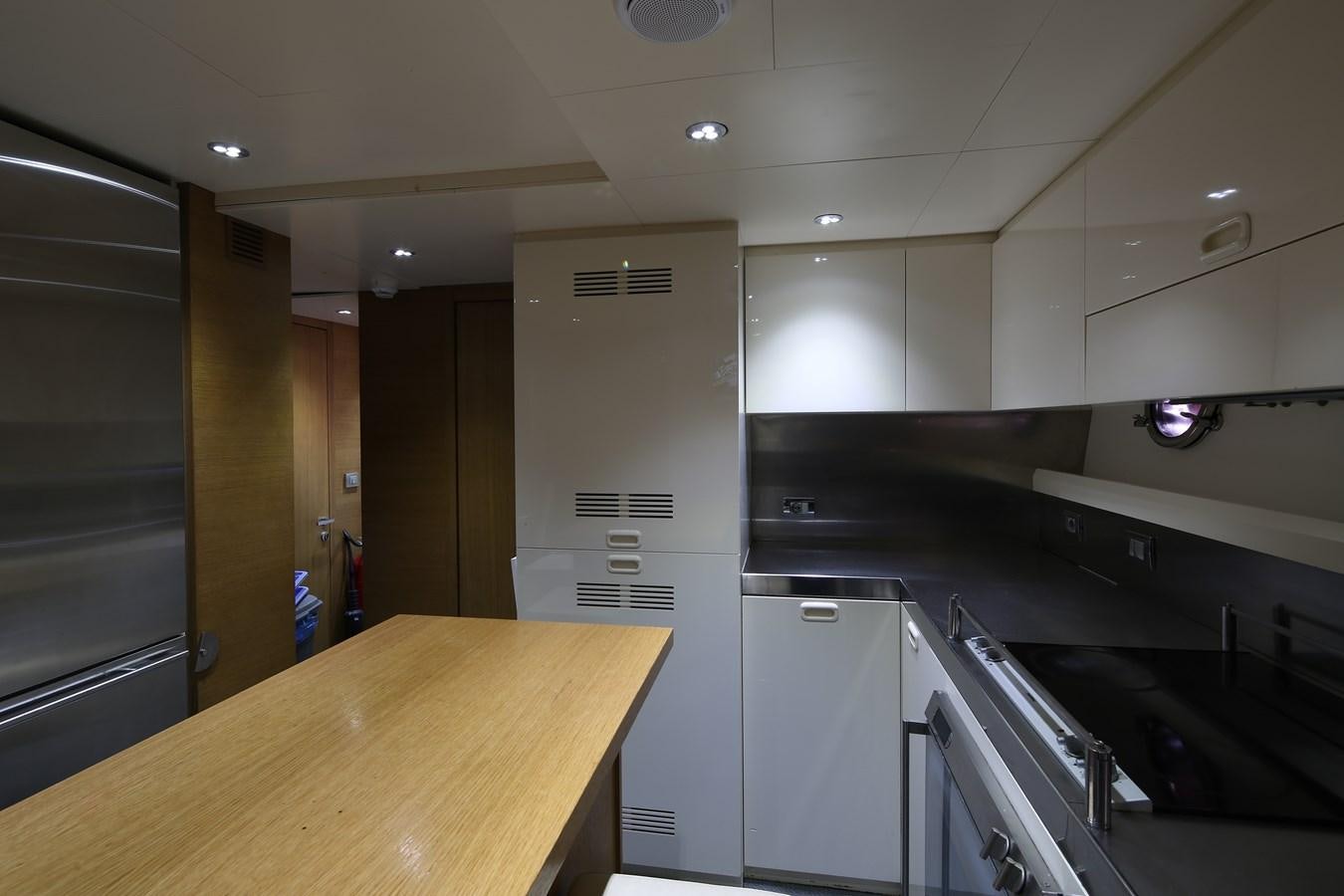 a kitchen with a large counter aboard 100 LEONARDO Yacht for Sale