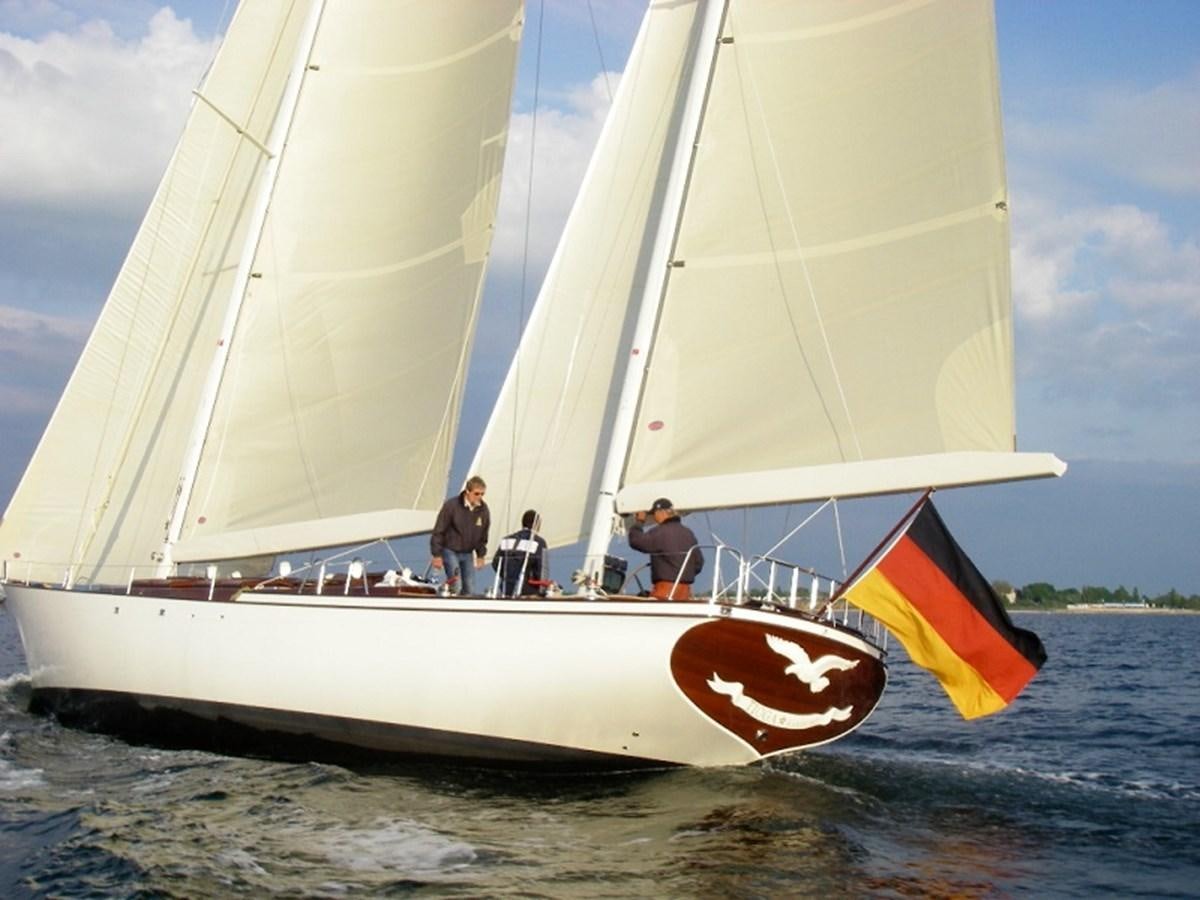 a group of people on a sailboat aboard TIOGA OF HAMBURG Yacht for Sale