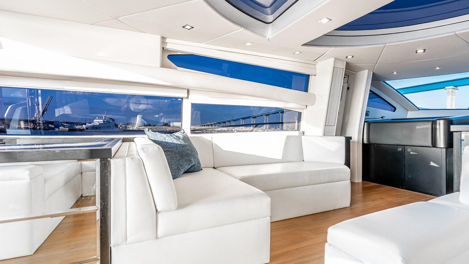 a room with a couch and a table aboard NORMA JEAN Yacht for Sale