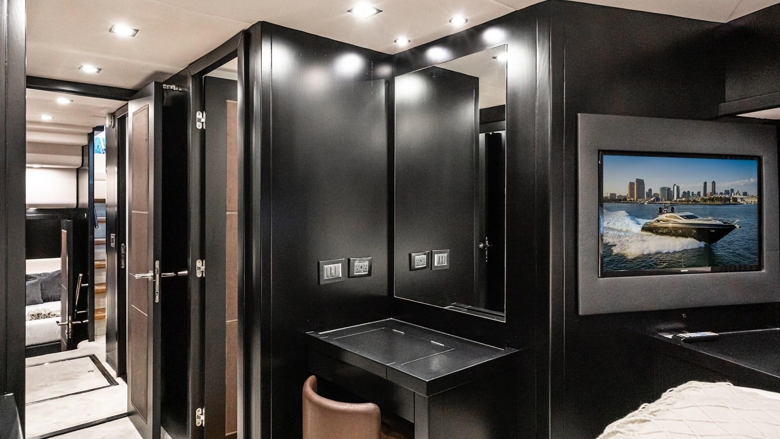 a room with a tv and a counter aboard NORMA JEAN Yacht for Sale