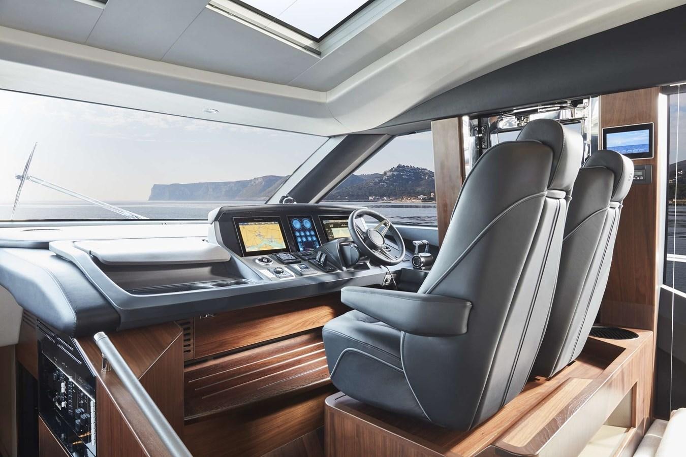 the inside of a car aboard SHINE Yacht for Sale