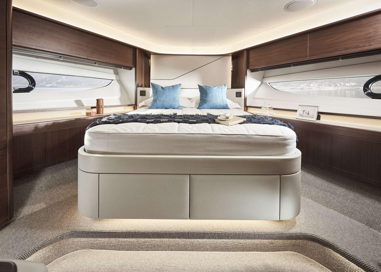 a bed in a room aboard SHINE Yacht for Sale
