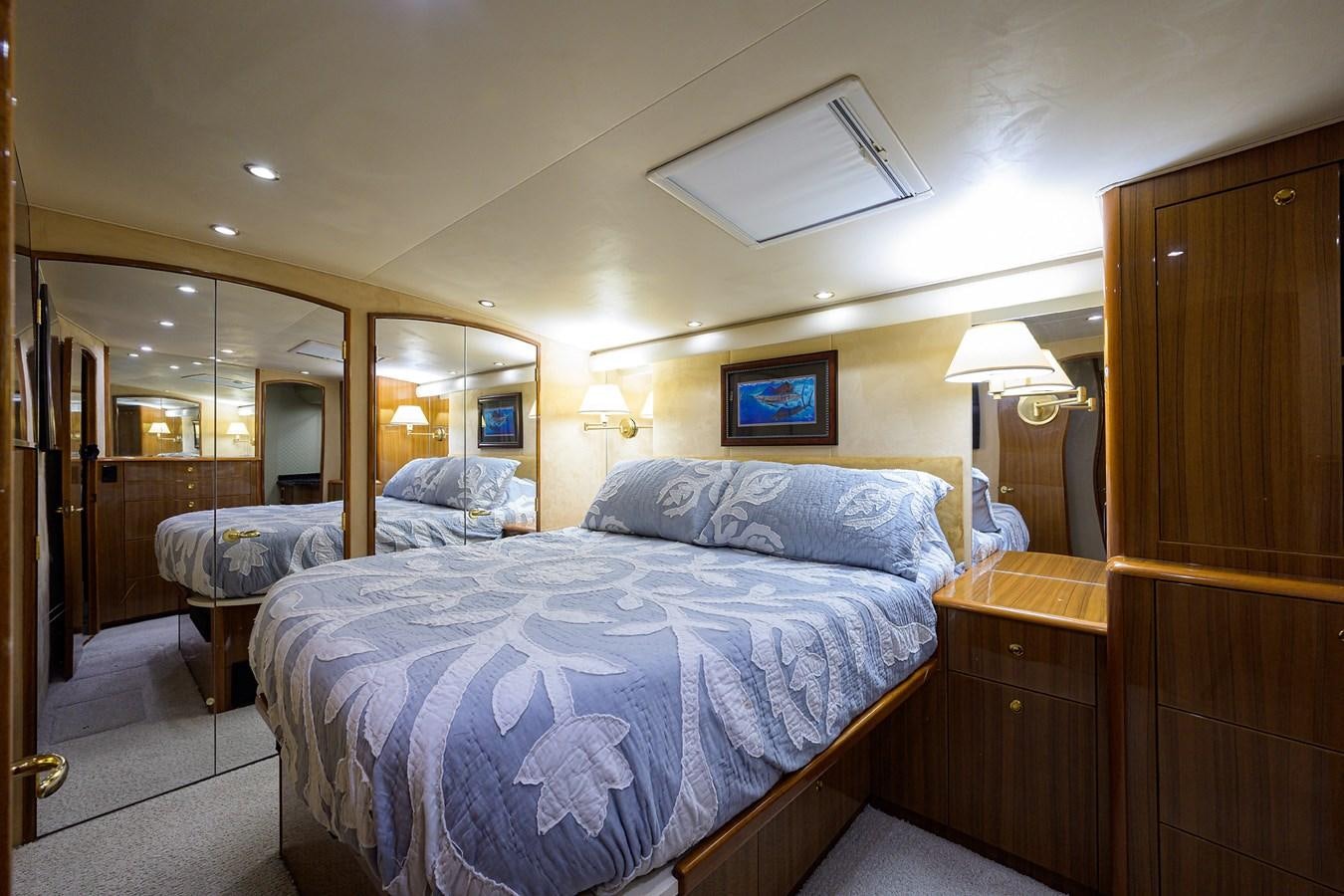 a couple of beds in a hotel room aboard 68 CONVERTIBLE Yacht for Sale