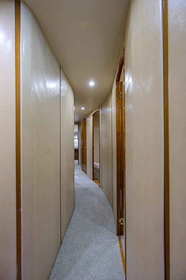 a hallway with a door and a hallway aboard 68 CONVERTIBLE Yacht for Sale