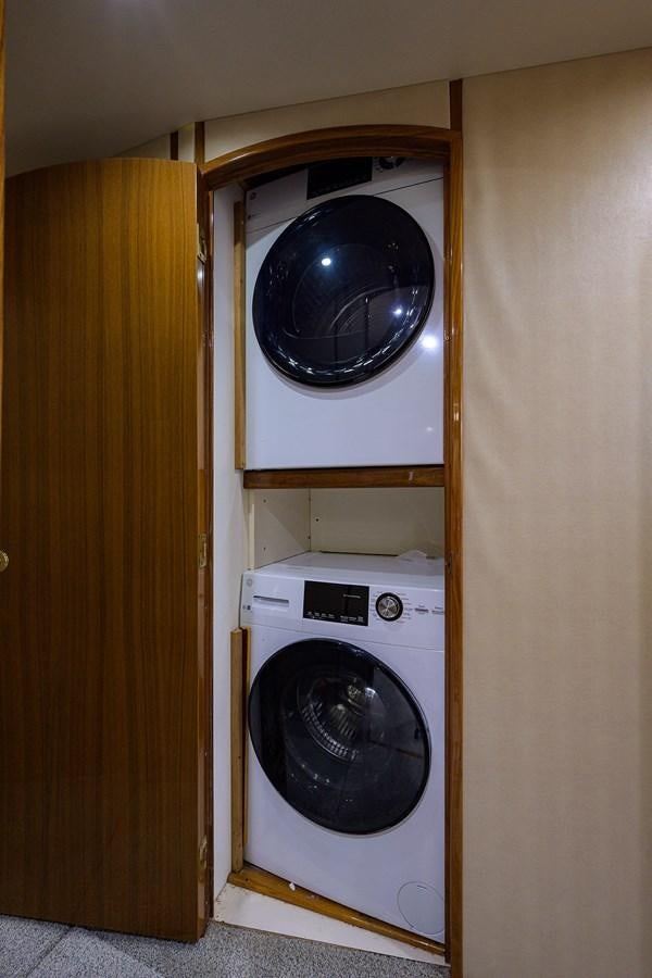 a white washing machine aboard 68 CONVERTIBLE Yacht for Sale