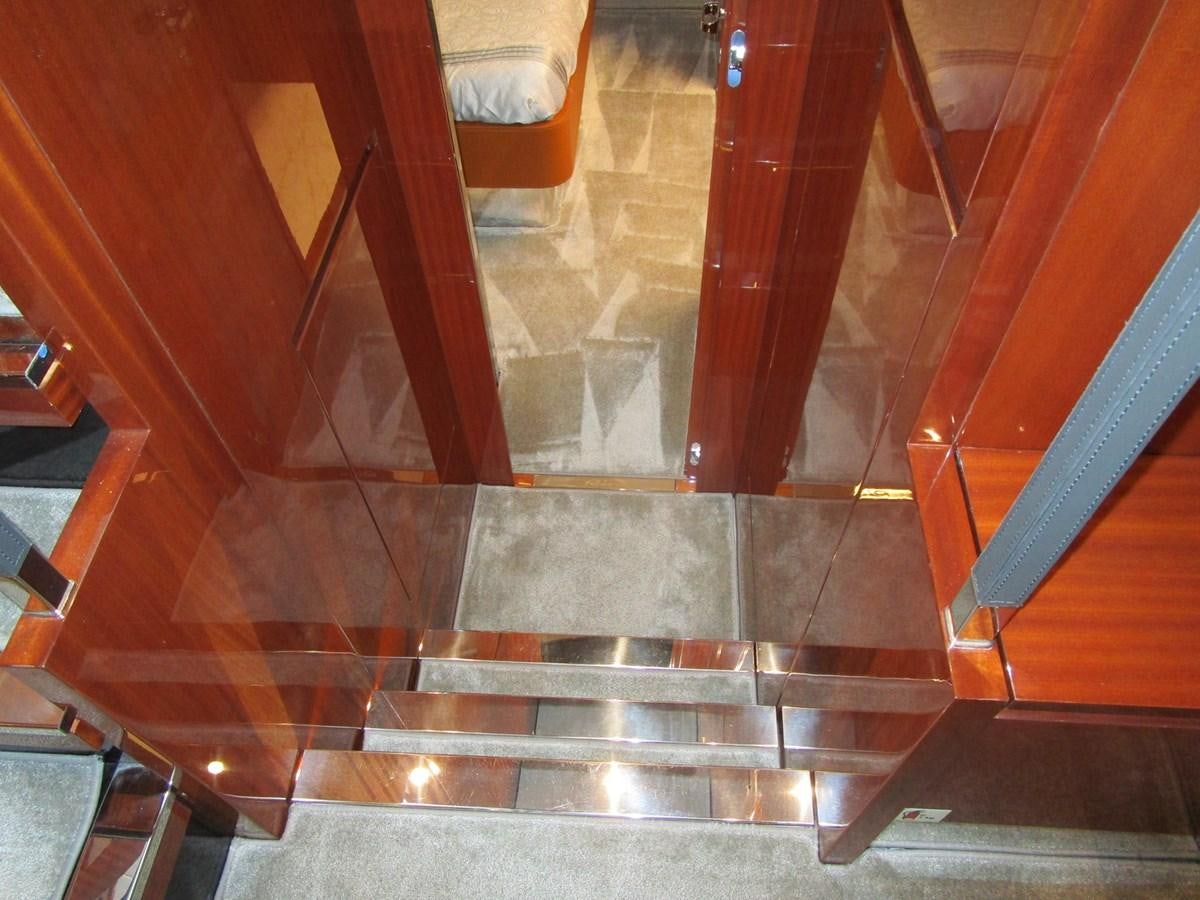 a staircase with orange and black tiles aboard REGENCY Yacht for Sale