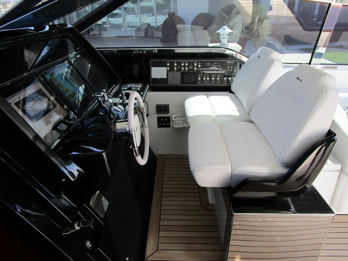 the inside of a car aboard REGENCY Yacht for Sale