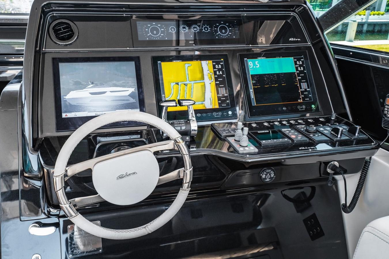 the inside of a car aboard REGENCY Yacht for Sale