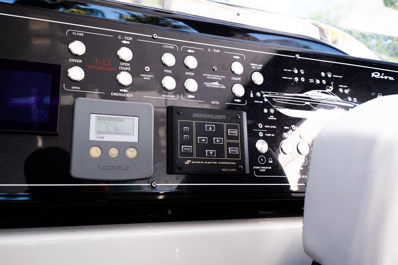 a person driving a car aboard REGENCY Yacht for Sale
