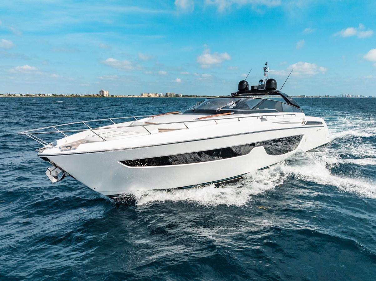 a white yacht on the water aboard REGENCY Yacht for Sale