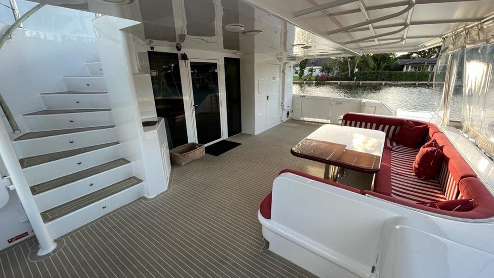 a room with a bed and a table aboard PEGASUS IX Yacht for Sale