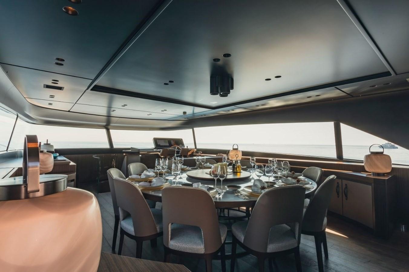 a large dining room with a large table and chairs aboard STRADIVARIUS Yacht for Sale