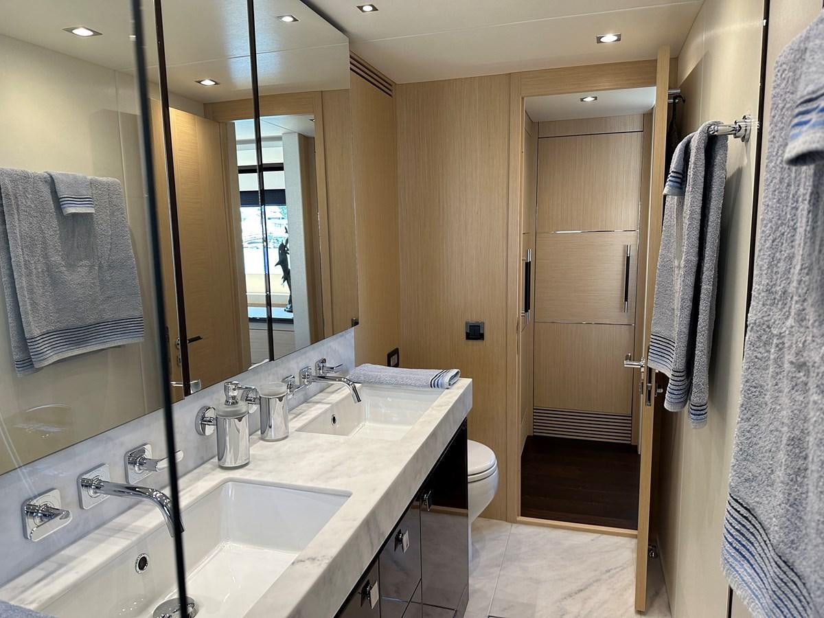 a bathroom with a sink and a mirror aboard K NUK Yacht for Sale