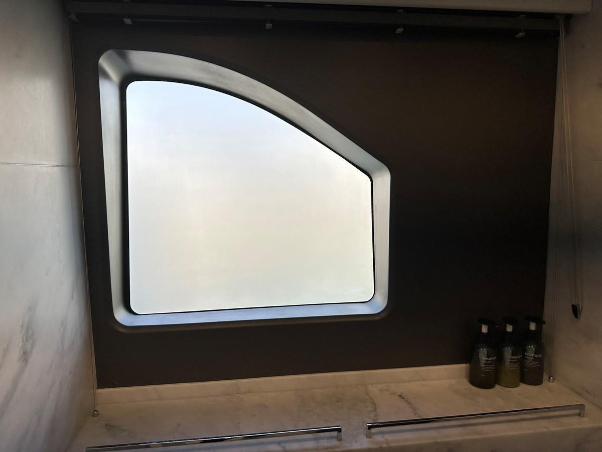 a white rectangular object with a black frame aboard K NUK Yacht for Sale