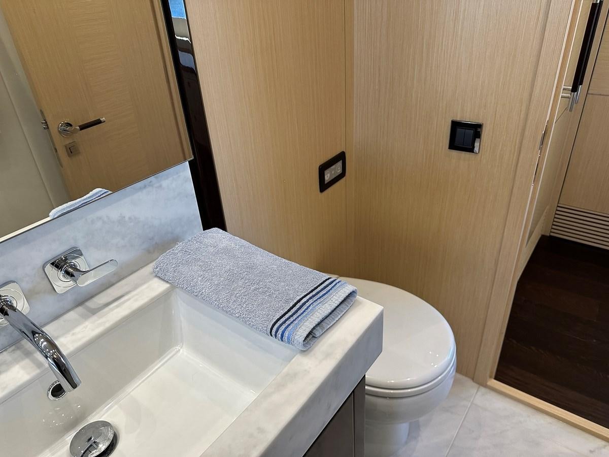 a bathroom with a sink and a toilet aboard K NUK Yacht for Sale