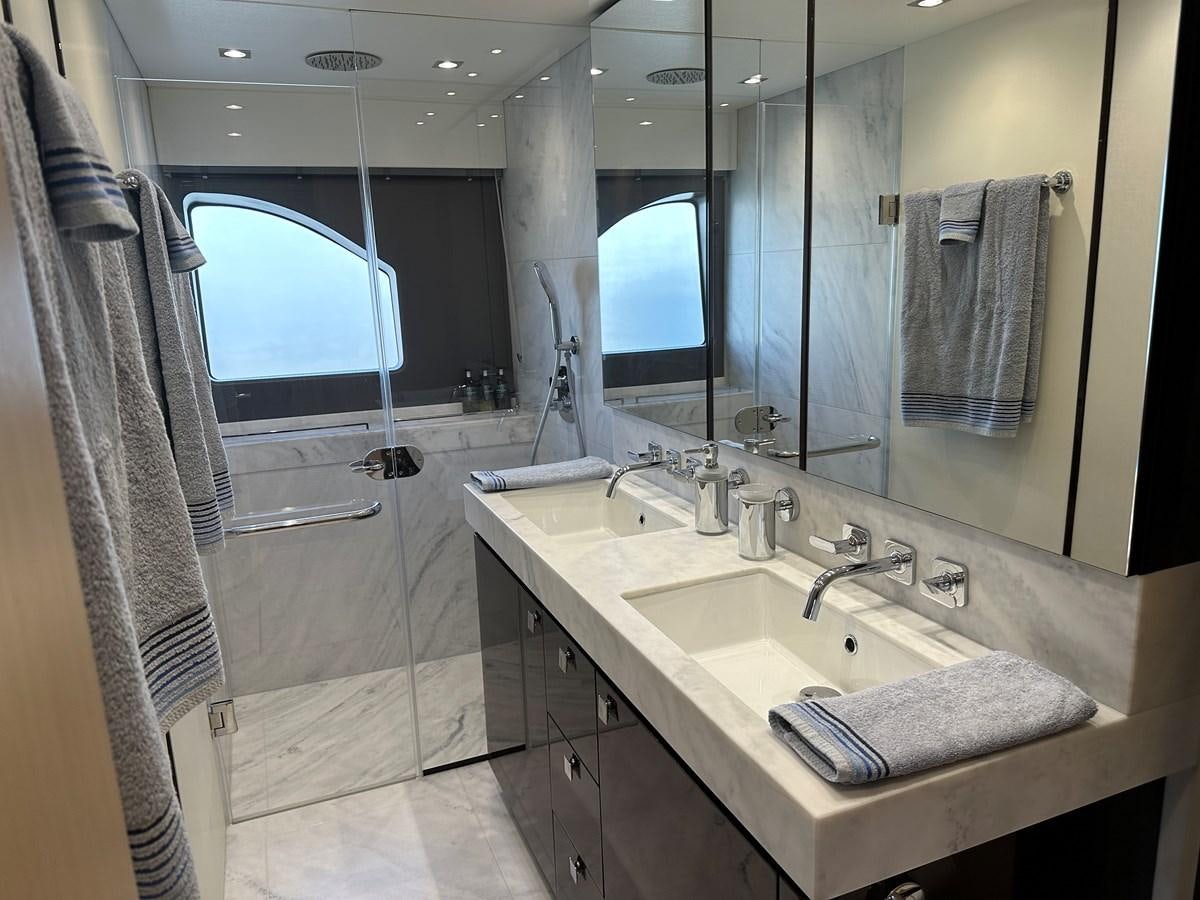 a bathroom with a sink and a mirror aboard K NUK Yacht for Sale