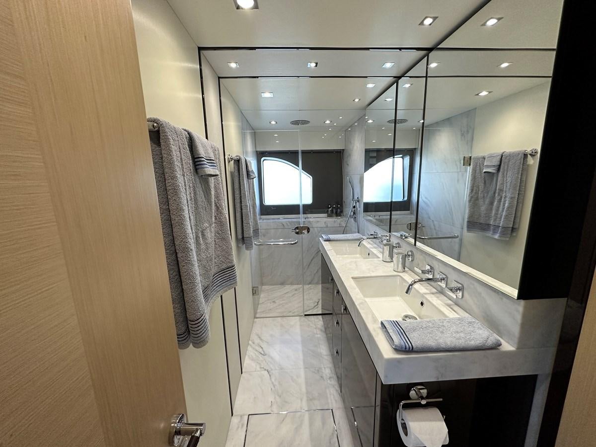 a bathroom with a sink and a mirror aboard K NUK Yacht for Sale