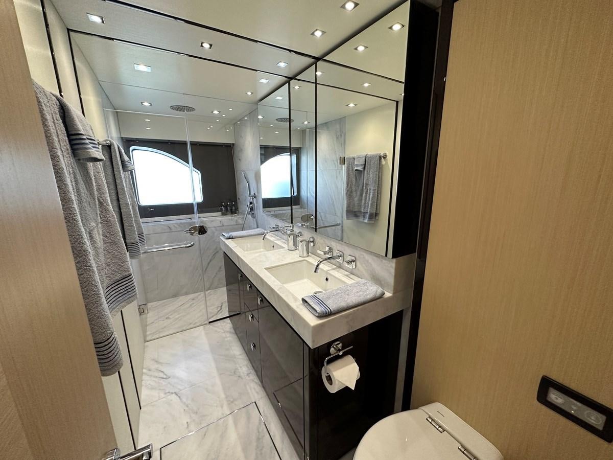 a bathroom with a sink and a mirror aboard K NUK Yacht for Sale