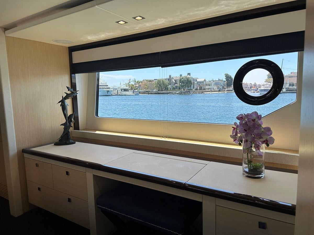 a window with a view of a city and water aboard K NUK Yacht for Sale