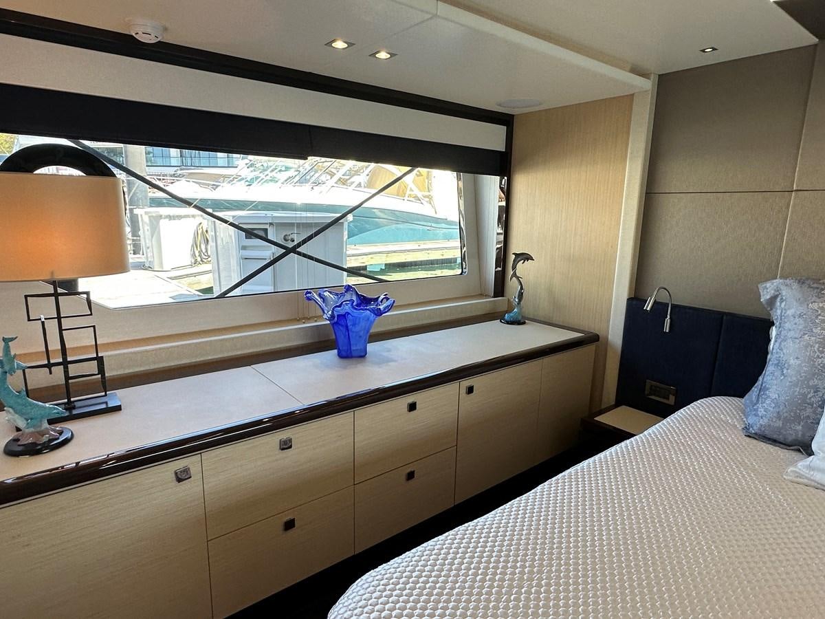 a room with a bed and a window aboard K NUK Yacht for Sale