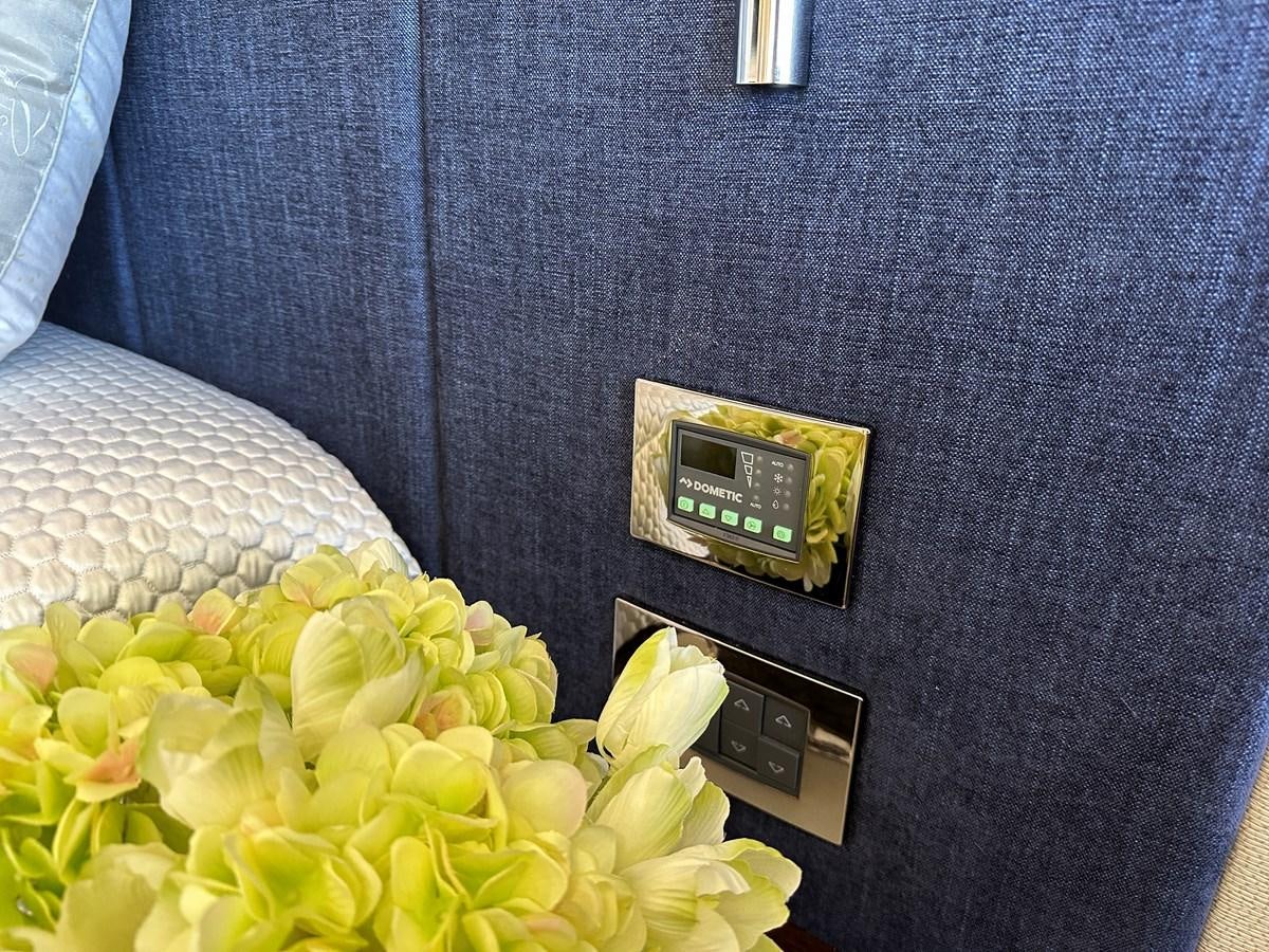 a phone on a table aboard K NUK Yacht for Sale