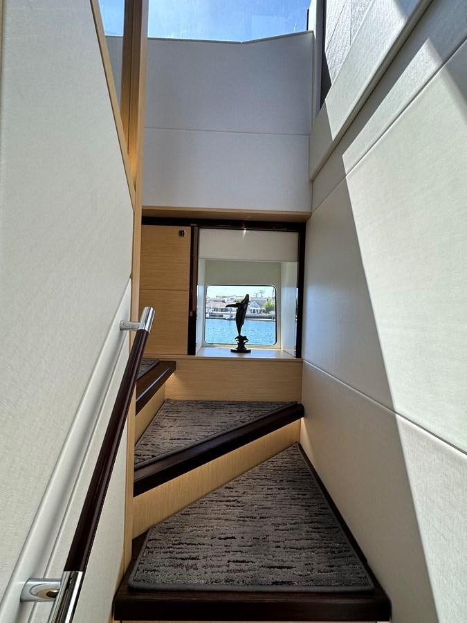 a staircase with a glass door aboard K NUK Yacht for Sale