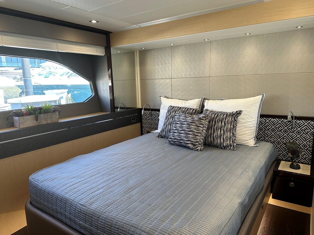 a bed with pillows aboard K NUK Yacht for Sale