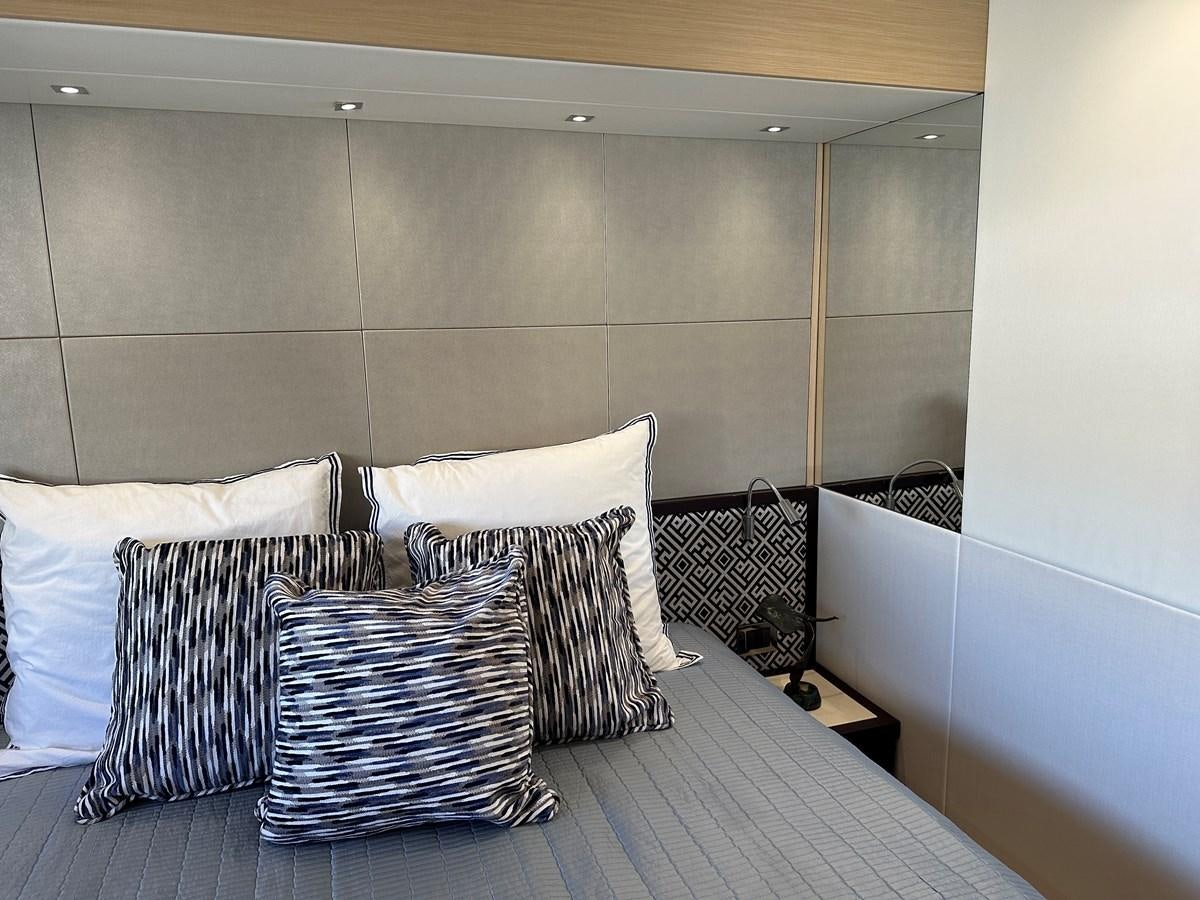 a bed with pillows aboard K NUK Yacht for Sale