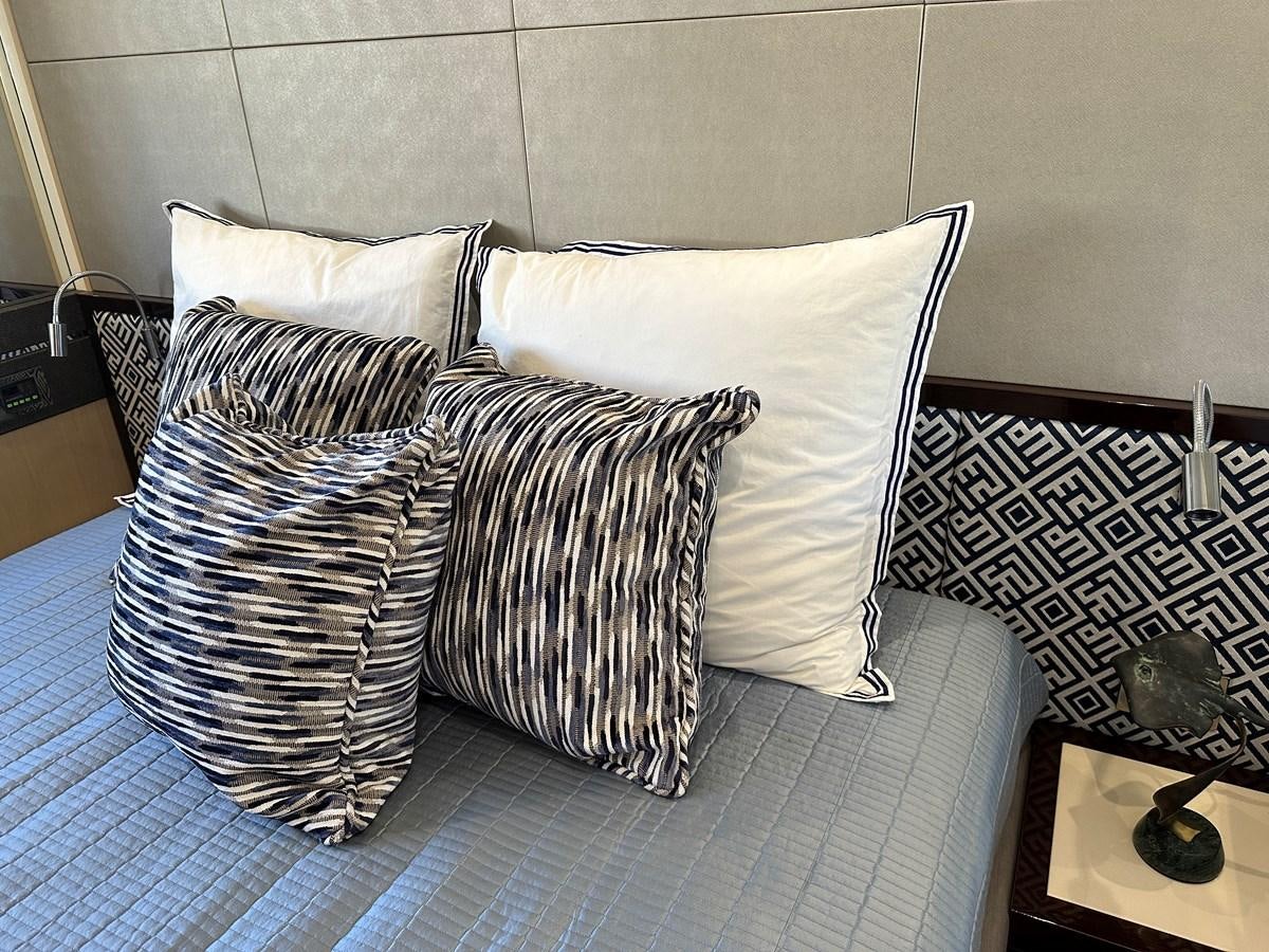 a couple of pillows on a bed aboard K NUK Yacht for Sale
