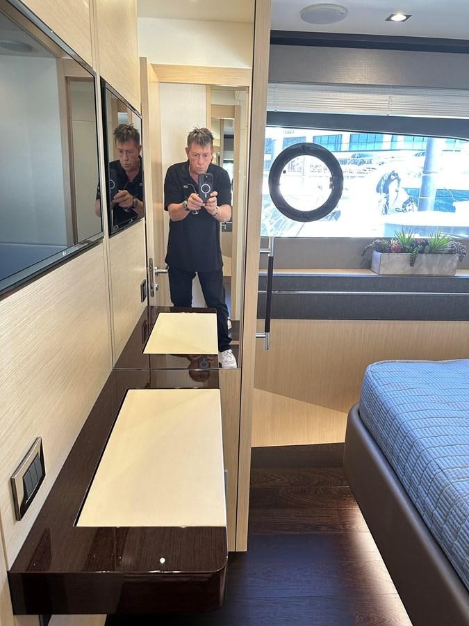 a person standing in a doorway aboard K NUK Yacht for Sale