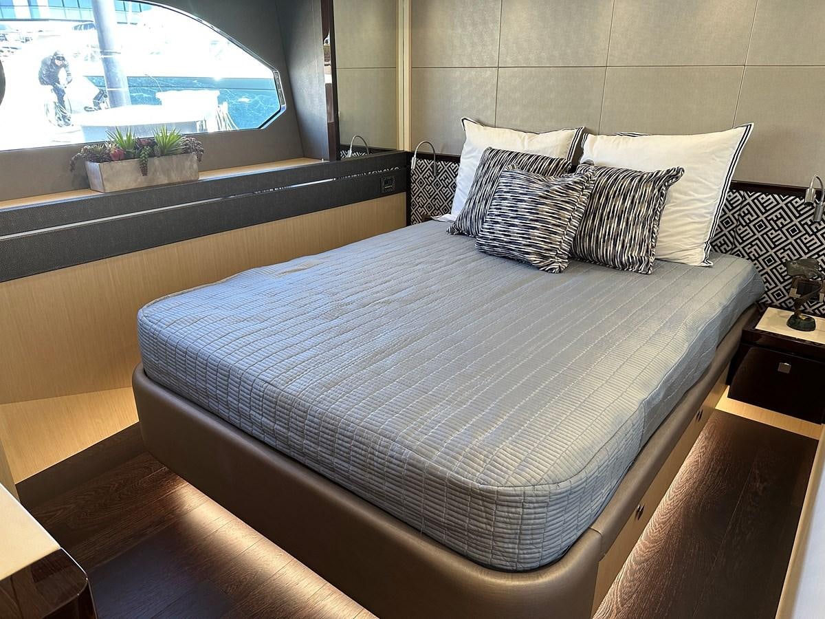 a bed with pillows aboard K NUK Yacht for Sale