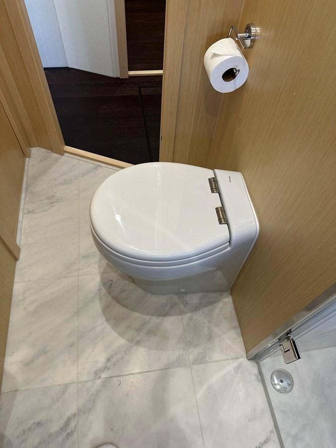 a toilet in a bathroom aboard K NUK Yacht for Sale