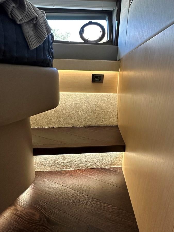 a person's legs and a window aboard K NUK Yacht for Sale