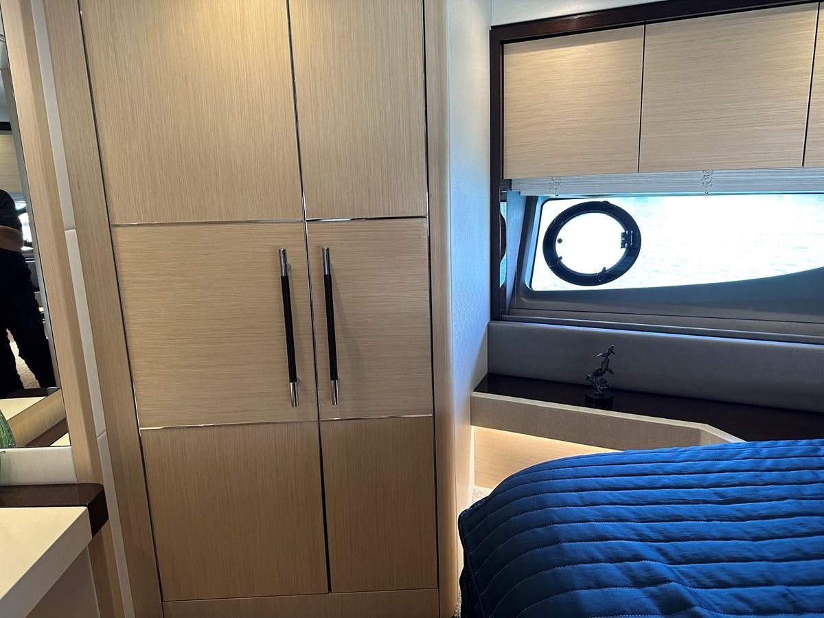 a room with a bed and a window aboard K NUK Yacht for Sale
