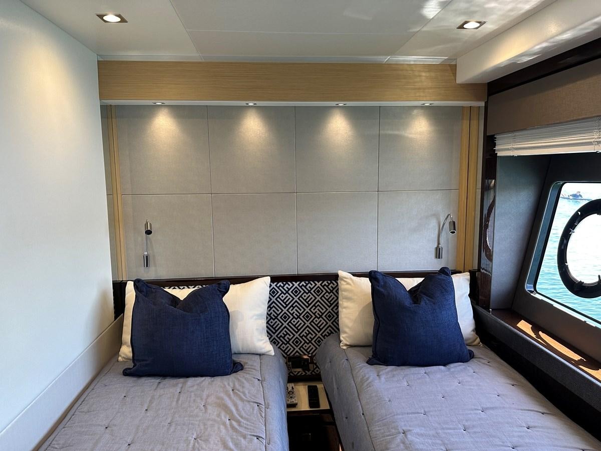 a bed with pillows aboard K NUK Yacht for Sale