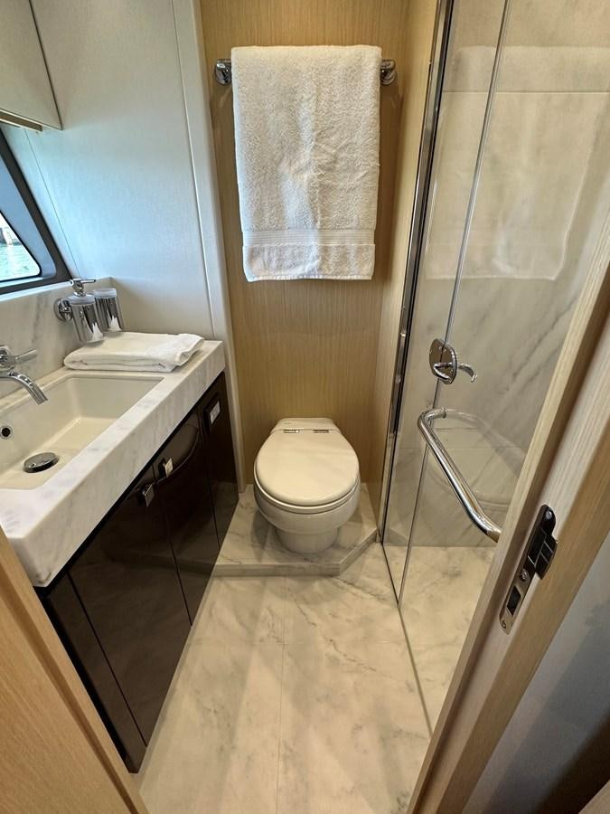 a bathroom with a toilet and sink aboard K NUK Yacht for Sale