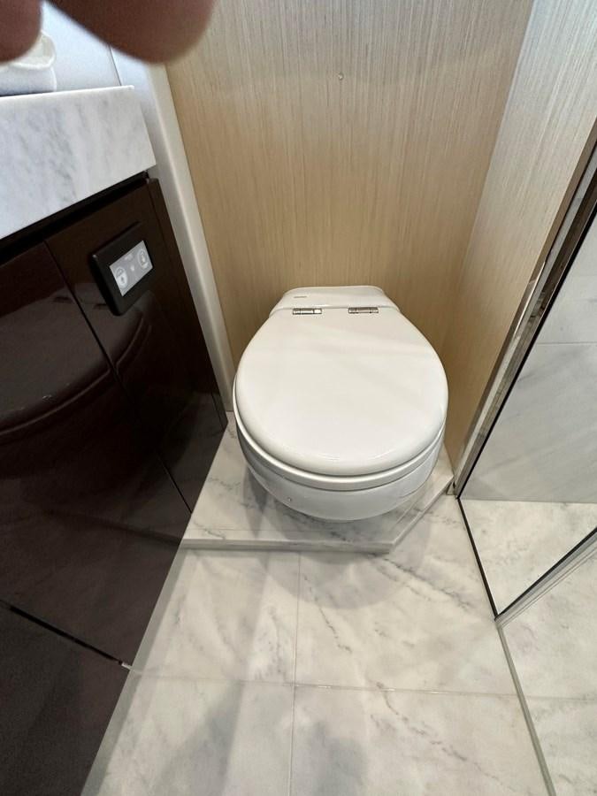 a toilet in a bathroom aboard K NUK Yacht for Sale