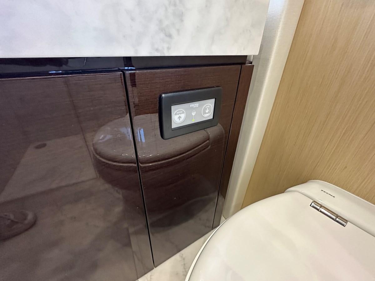 a vacuum cleaner in a room aboard K NUK Yacht for Sale