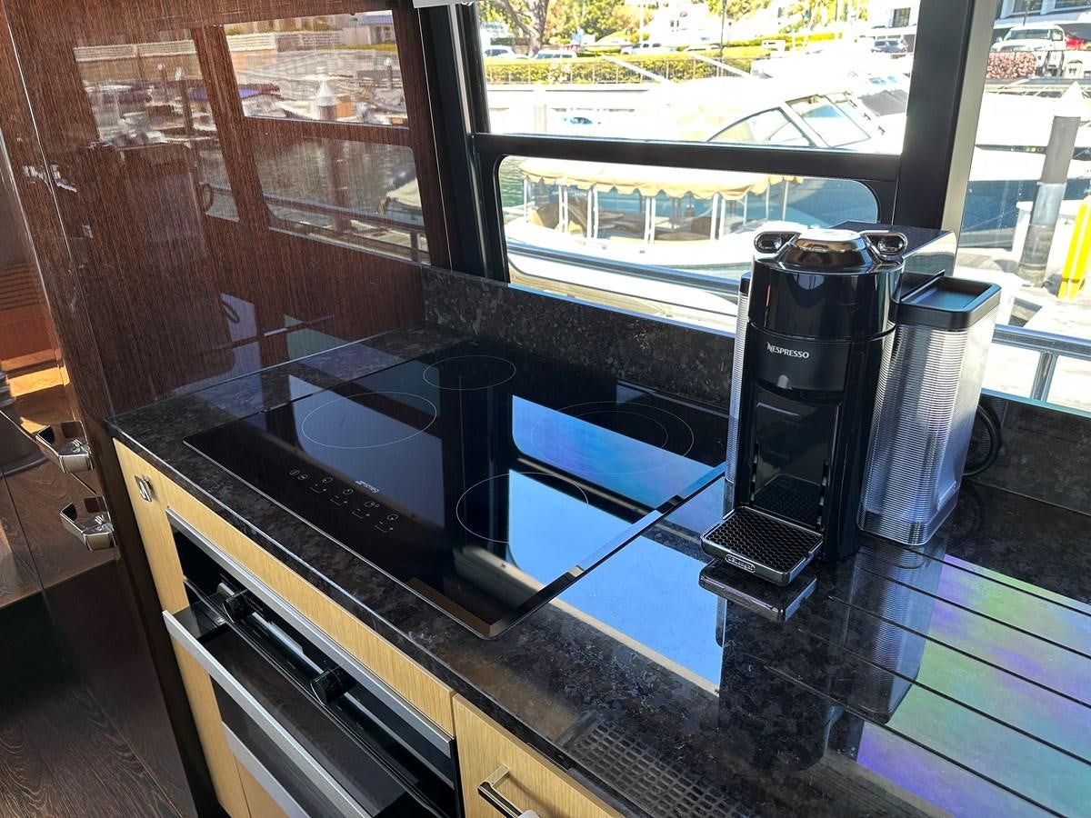 a large black machine on a counter aboard K NUK Yacht for Sale