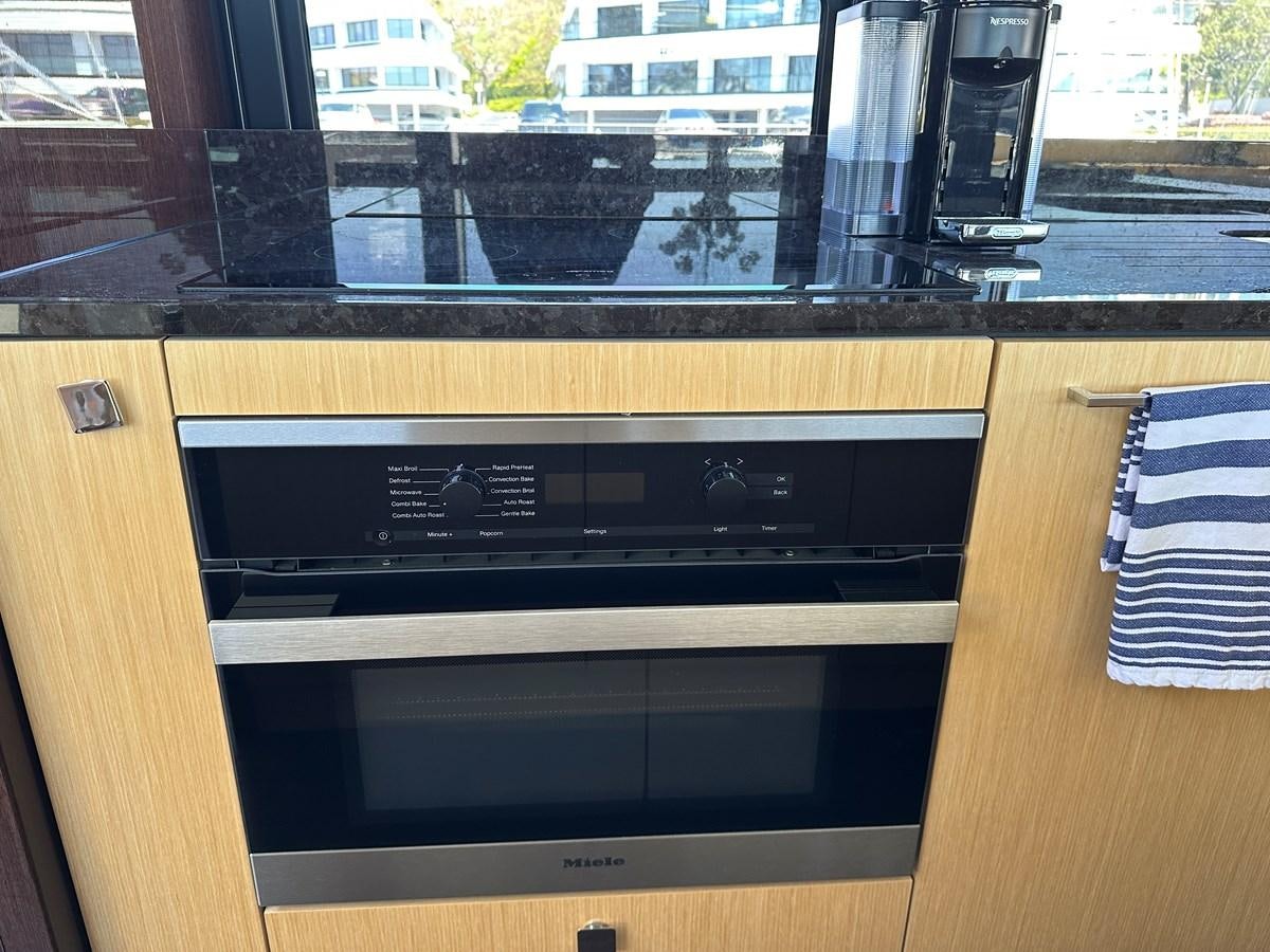 a stove in a kitchen aboard K NUK Yacht for Sale