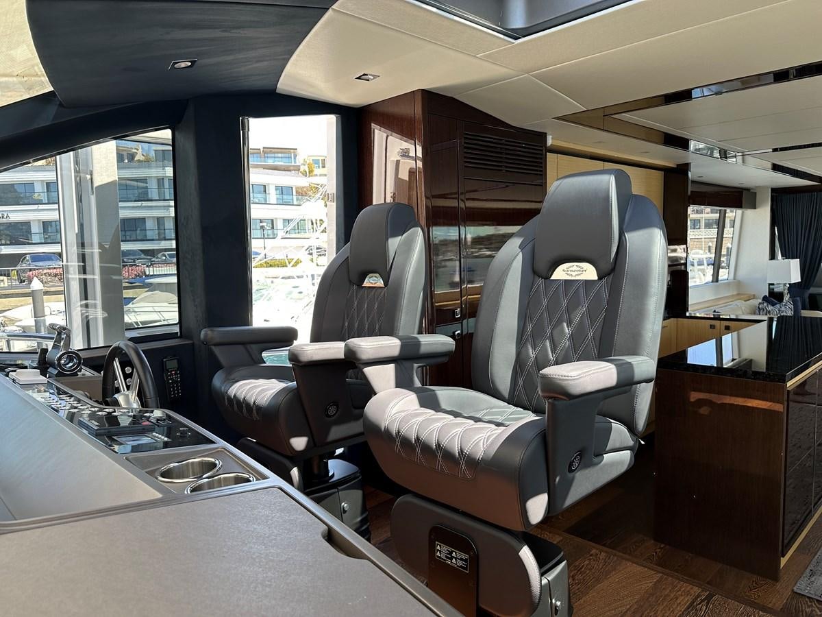 a room with a table chairs and a sink aboard K NUK Yacht for Sale